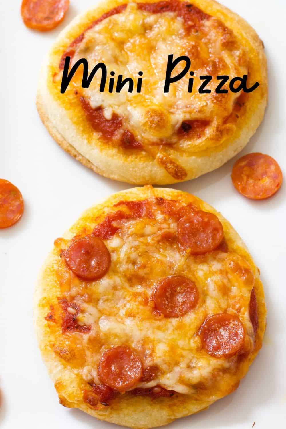 Mini Pepperoni Pizza Appetizers are super easy and require just 4 ingredients; store bought pizza crust, sauce, pepperoni and cheese. #appetizer #pepperonipizza #easyappetizer #minipizza
