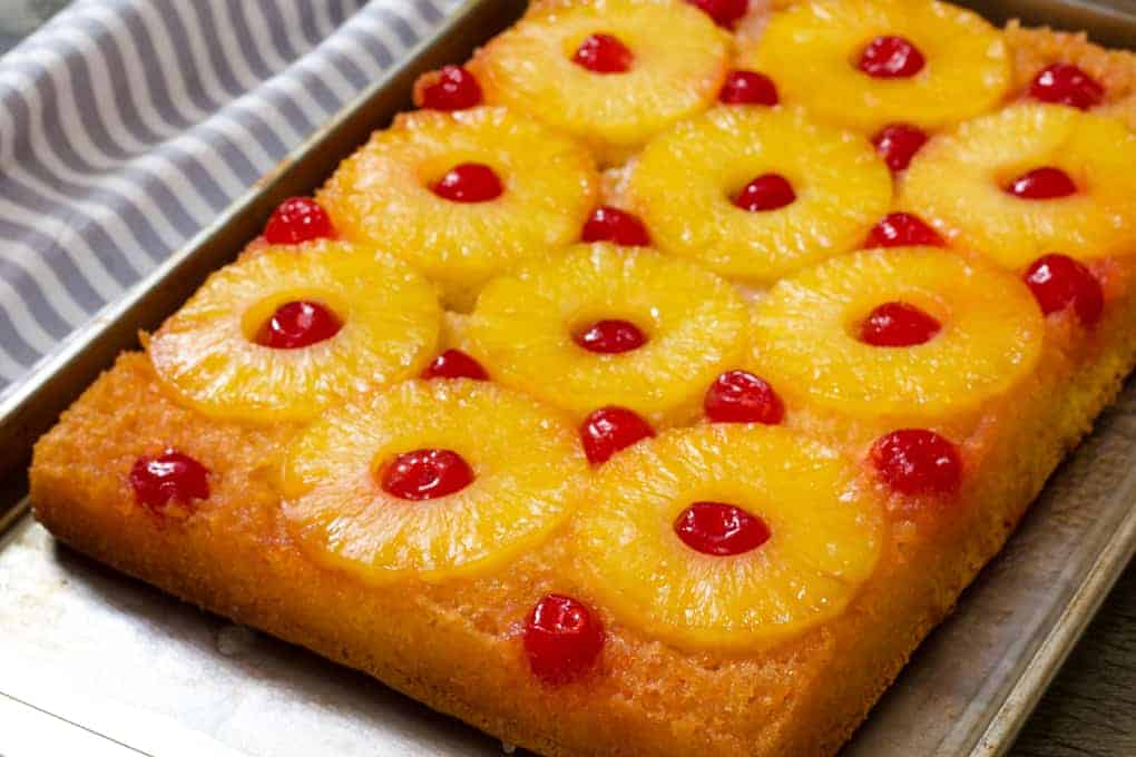 Pineapple Upside Down Cake recipe features pineapple and maraschino cherries and transforms boxed cake into an easy and special treat!