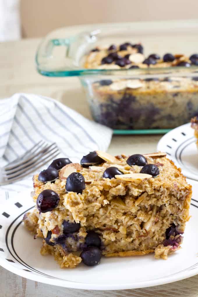Blueberry Almond Baked Oatmeal is easy and full of healthful ingredients like oats, almonds, blueberries, unsweetened applesauce and eggs.