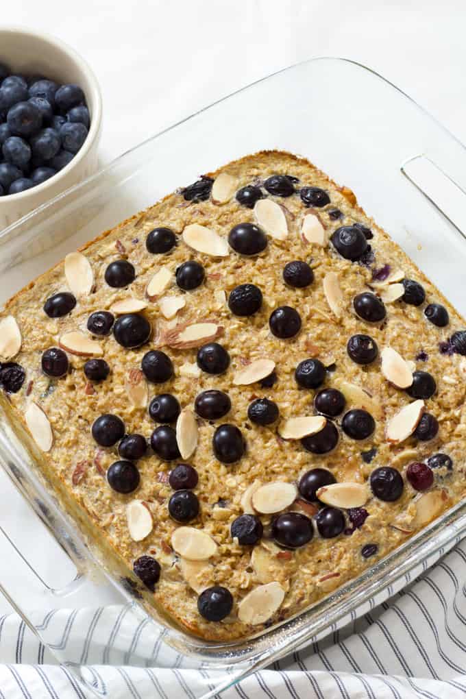 Blueberry Almond Baked Oatmeal is easy and full of healthful ingredients like oats, almonds, blueberries, unsweetened applesauce and eggs.