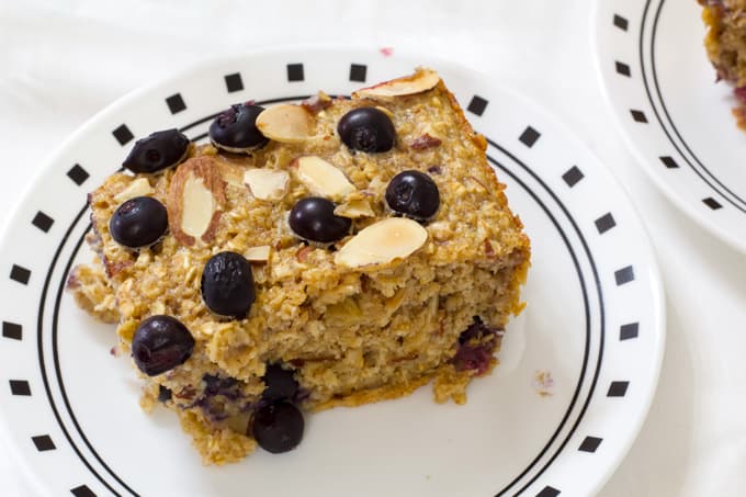 Blueberry Almond Baked Oatmeal is easy and full of healthful ingredients like oats, almonds, blueberries, unsweetened applesauce and eggs.