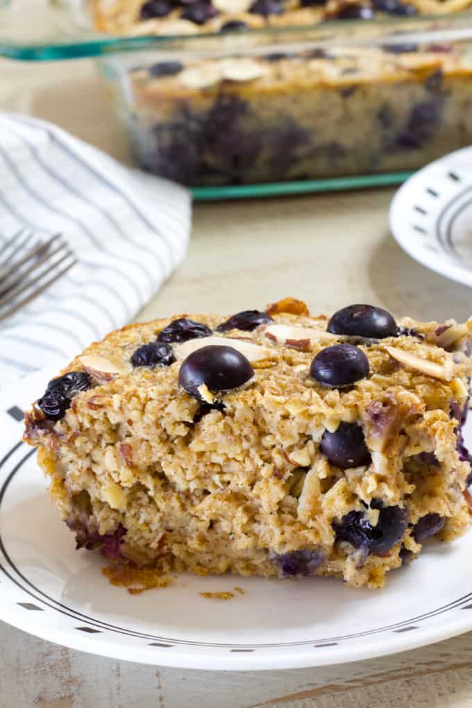 Blueberry Almond Baked Oatmeal is easy and full of healthful ingredients like oats, almonds, blueberries, unsweetened applesauce and eggs.