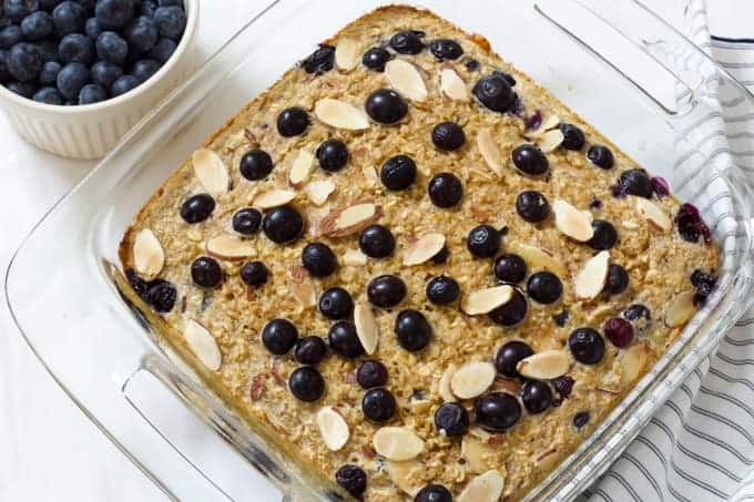 Blueberry Almond Baked Oatmeal is easy and full of healthful ingredients like oats, almonds, blueberries, unsweetened applesauce and eggs. 