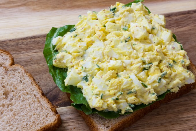 How to make a Classic Egg Salad sandwich with mayonnaise, grainy Dijon mustard, salt pepper and chives. An easy, simple and quick recipe.