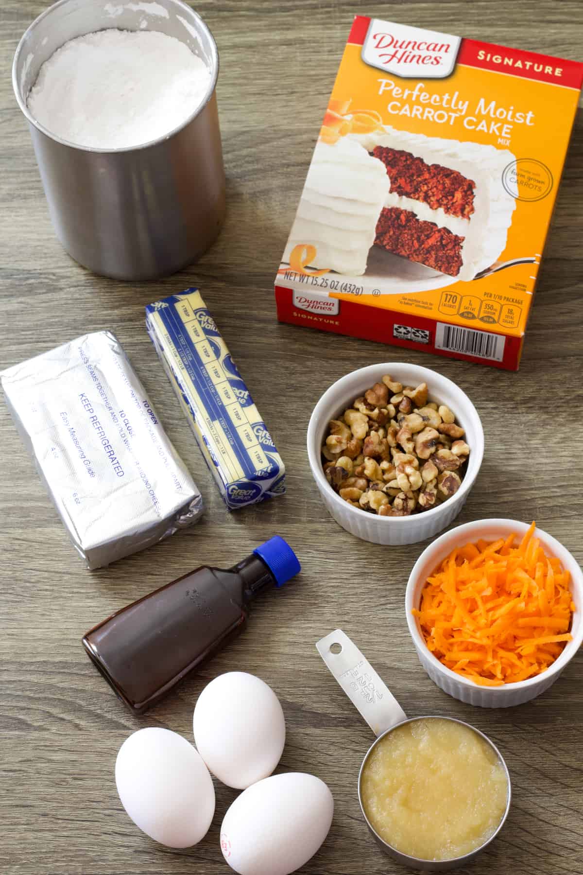 Ingredients need to make Carrot Cake Mix Cookies (easy recipe) such as cake mix, eggs, carrots.