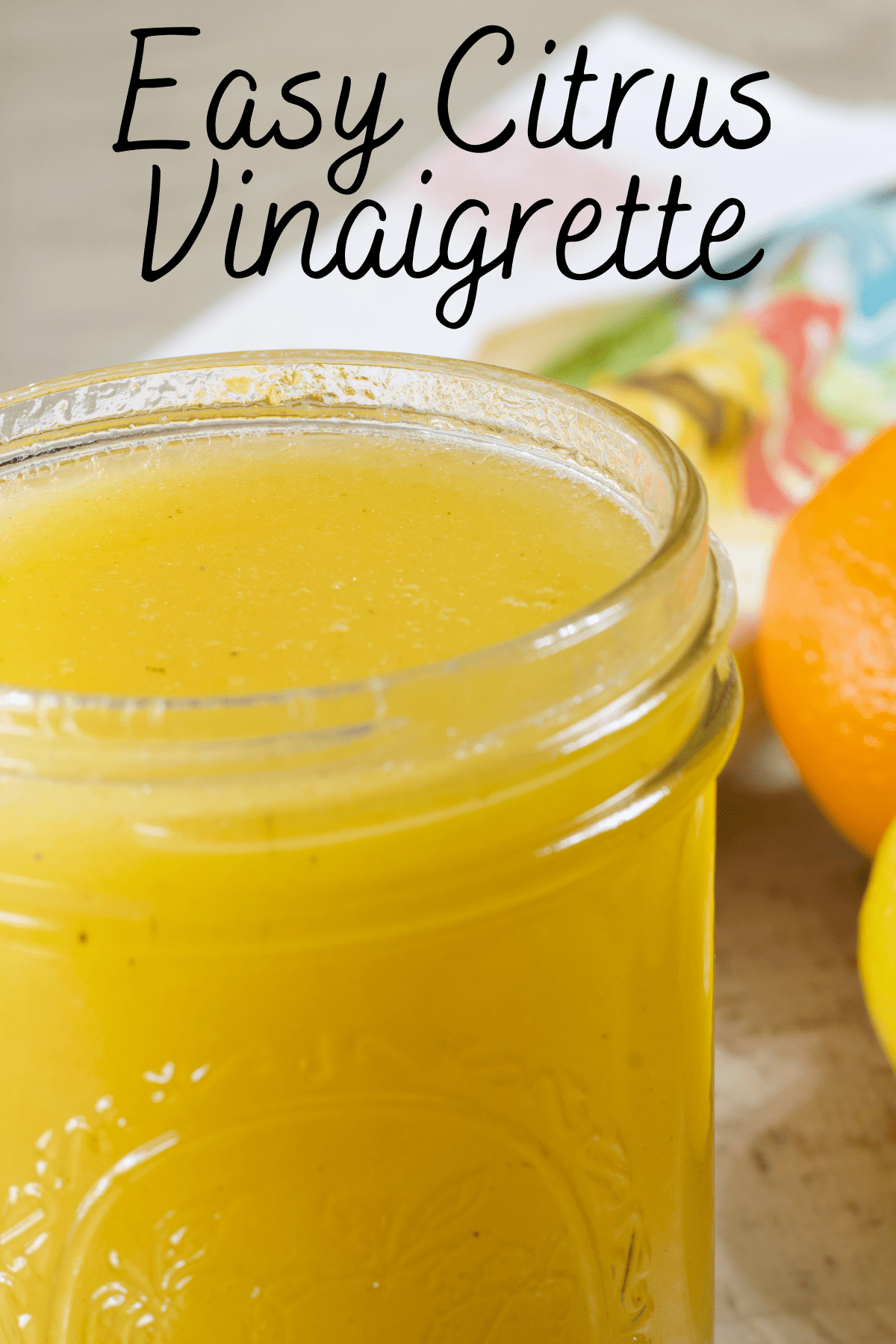 Close up view of a jar of salad dressing to be shared on Pinterest.