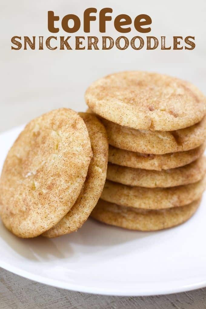 Close up view of a stack of 6 toffee snickerdoodle cookies and 2 leaning cookies leaning up against he stack.