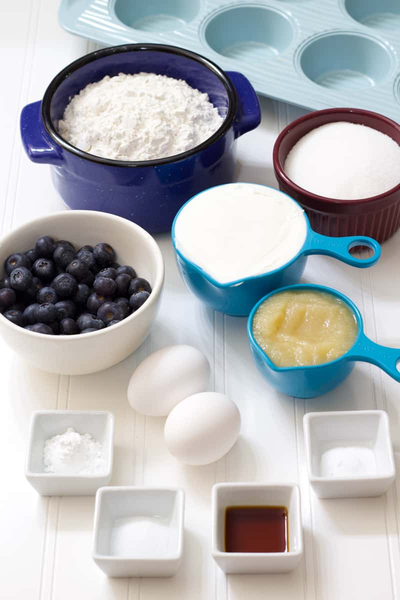 The ingredients needed to make blueberry sour cream muffins.