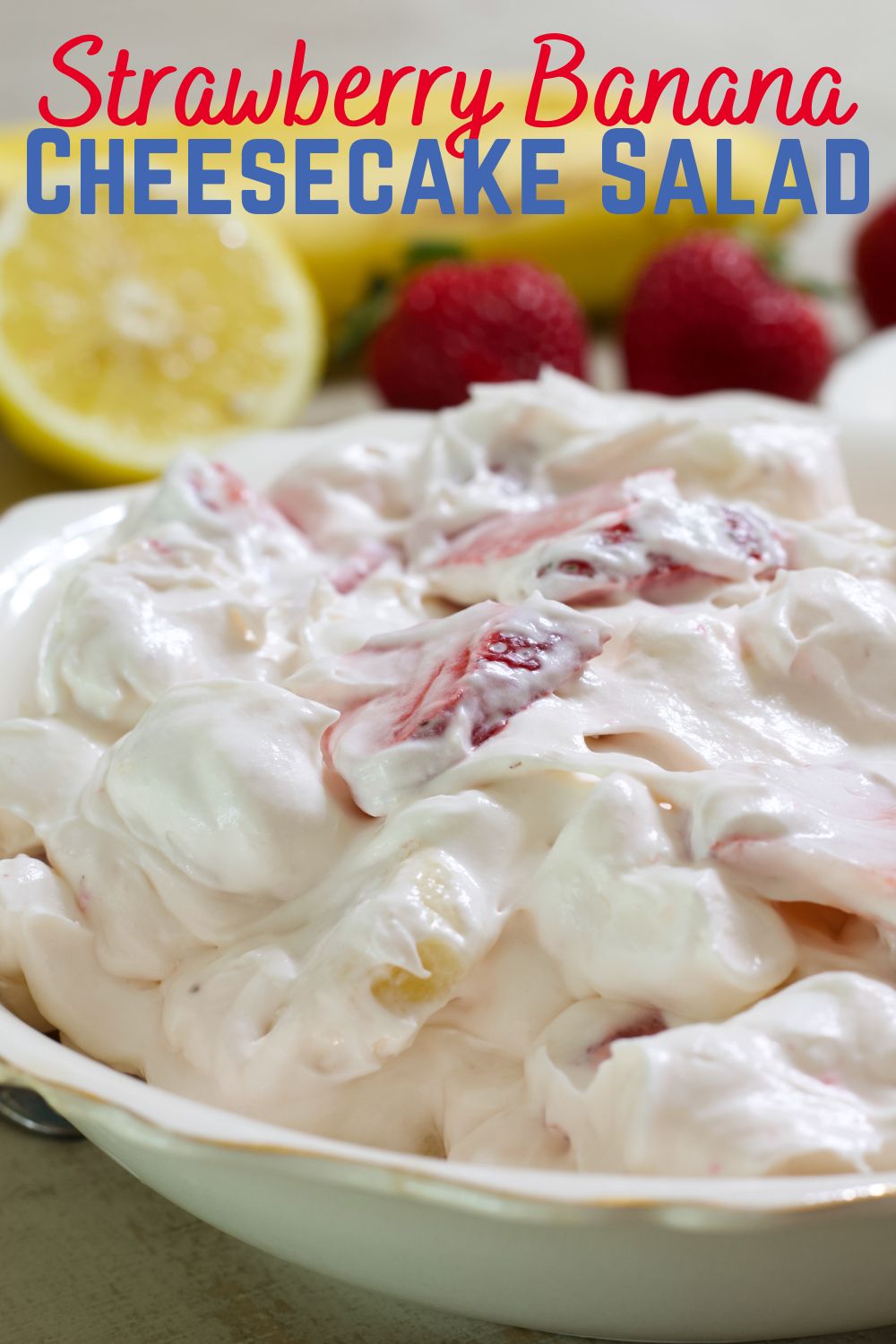 The Best Strawberry Banana Cheesecake Salad is made with cream cheese, sugar, whipped topping, fresh fruit, yogurt and mini marshmallows. #cheesecakesalad #strawberrybanana #potluckfood #fruitsalad via @mindyscookingobsession