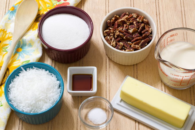 A table with the ingredients on it to make the topping for a tornado cake.