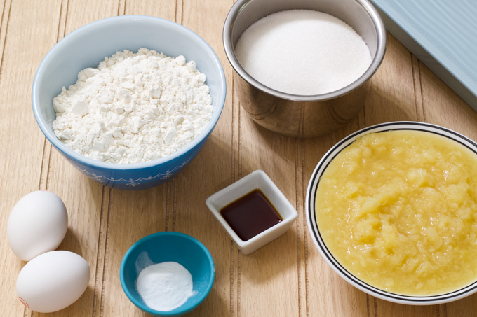 A table with the ingredients on it to make a torndo cake. 