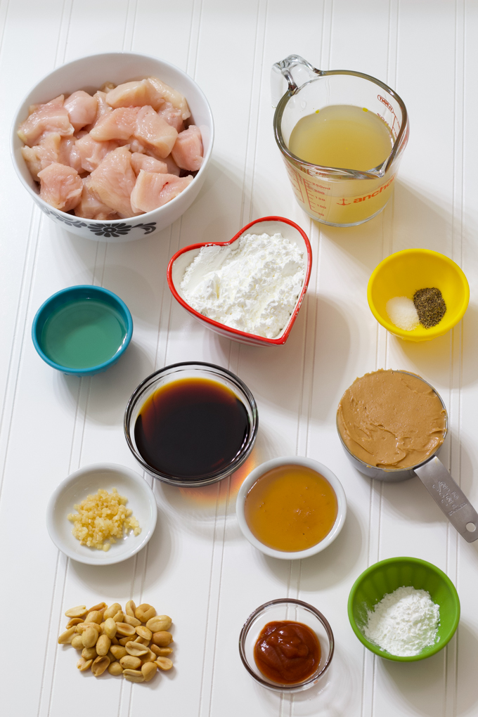 All of the ingredients to make the dish in small bowls on a table.