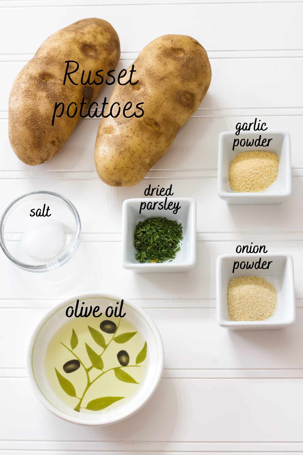 The six ingredients needed to make the recipe measured out sitting on a table.