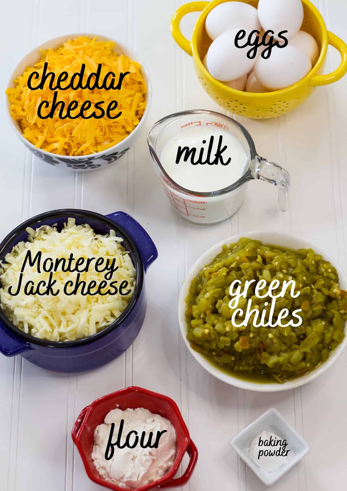 All of the ingredients needed to make the easy hatch chile rellenos casserole recipe with text over each ingredient.