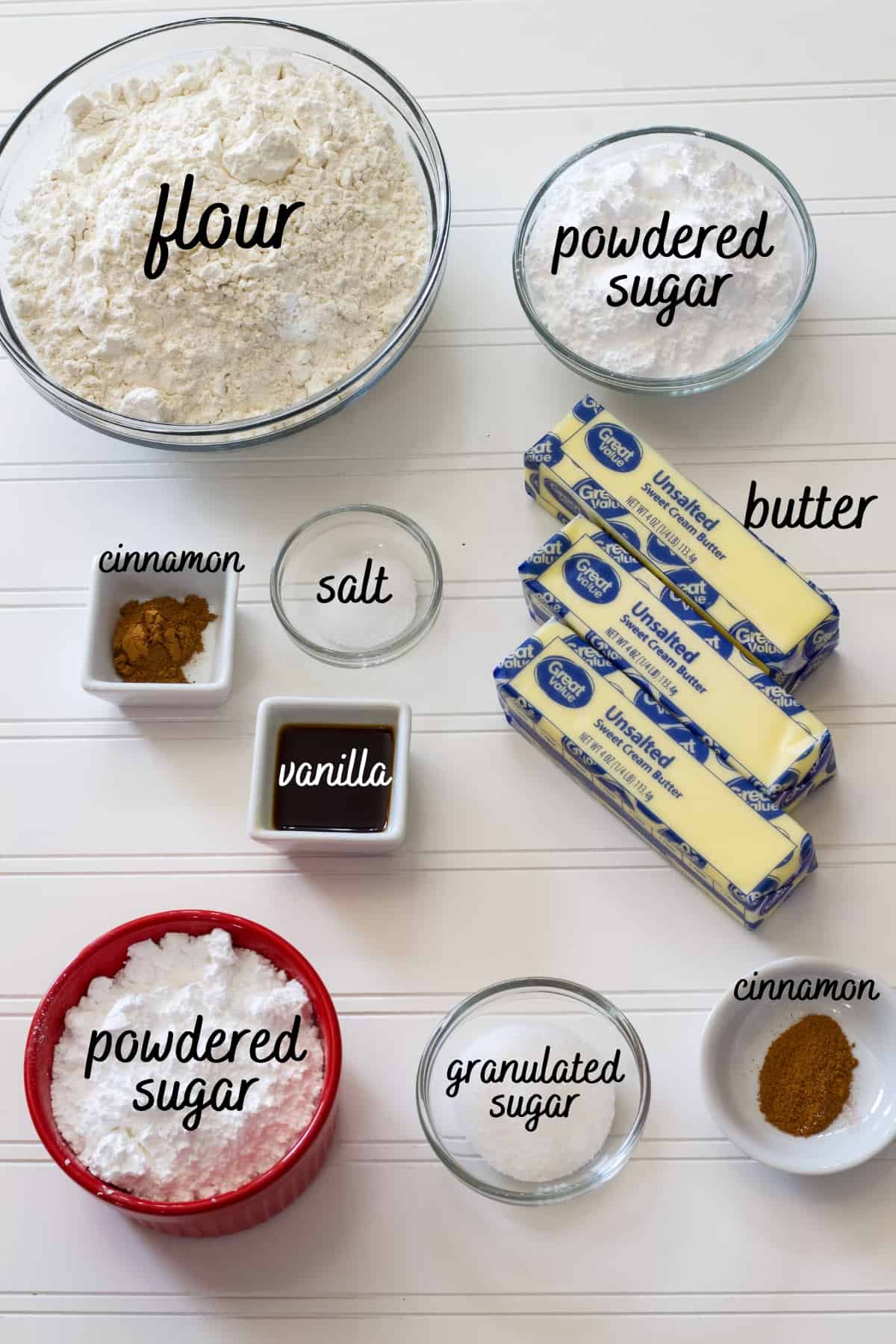 All of the ingredients to make the cookies on a white background with the titles of the ingredients over them.