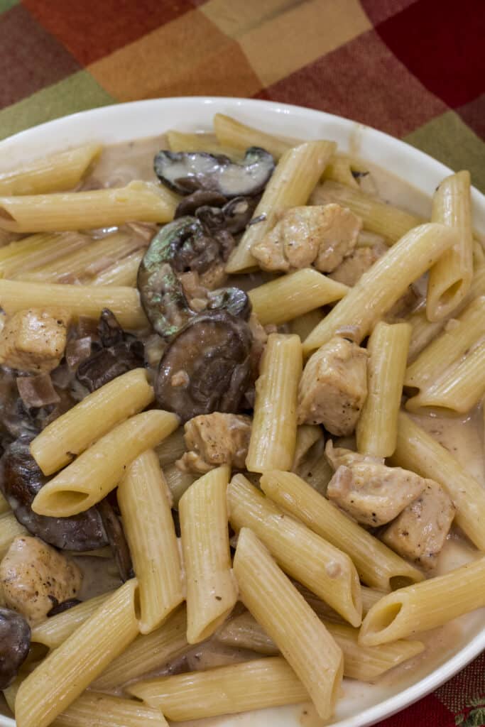 Close up of one serving of copycat da vinci pasta on a white plate.