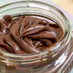 Close up of the frosting in a mason jar.