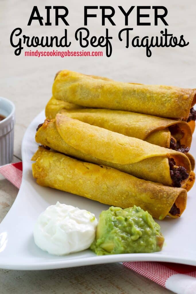 A plate of Easy Homemade Air Fryer Ground Beef Taquitos with a scoop of sour cream and guacamole with the recipe title at the top.