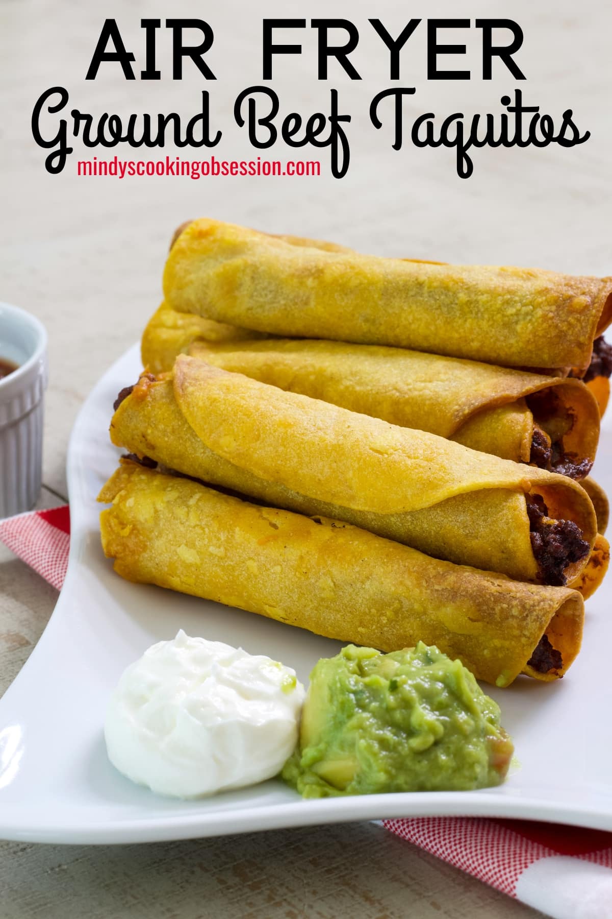 Easy Homemade Air Fryer Ground Beef Taquitos Recipe is quick and perfect for a quick meal or snack for game day or a party.  via @mindyscookingobsession