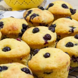 A very close up of several muffins on a table.