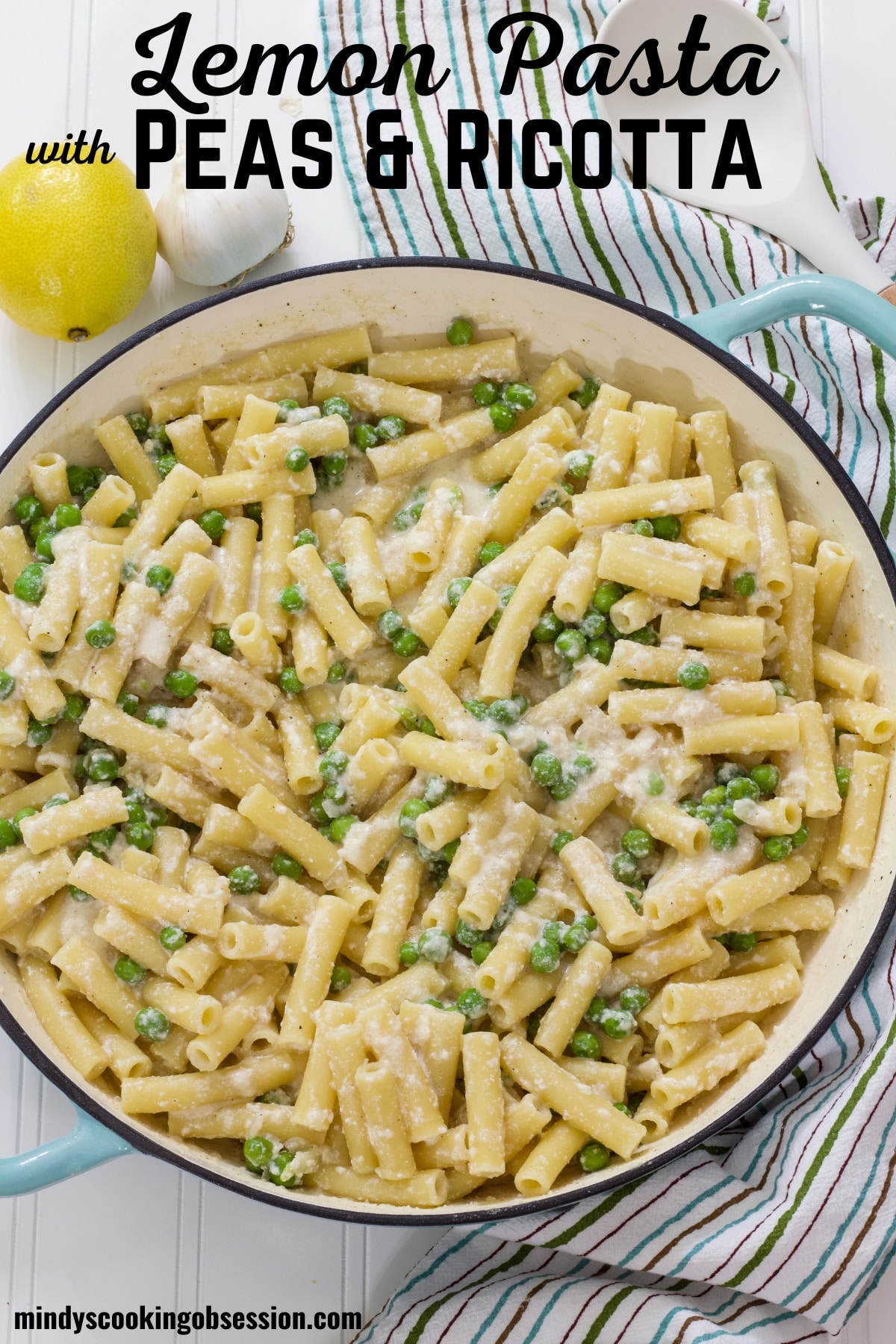 Easy Lemon Pasta with Peas and Ricotta Recipe is a meatless dish that is ready in about 30 minutes and perfect for any night of the week! via @mindyscookingobsession