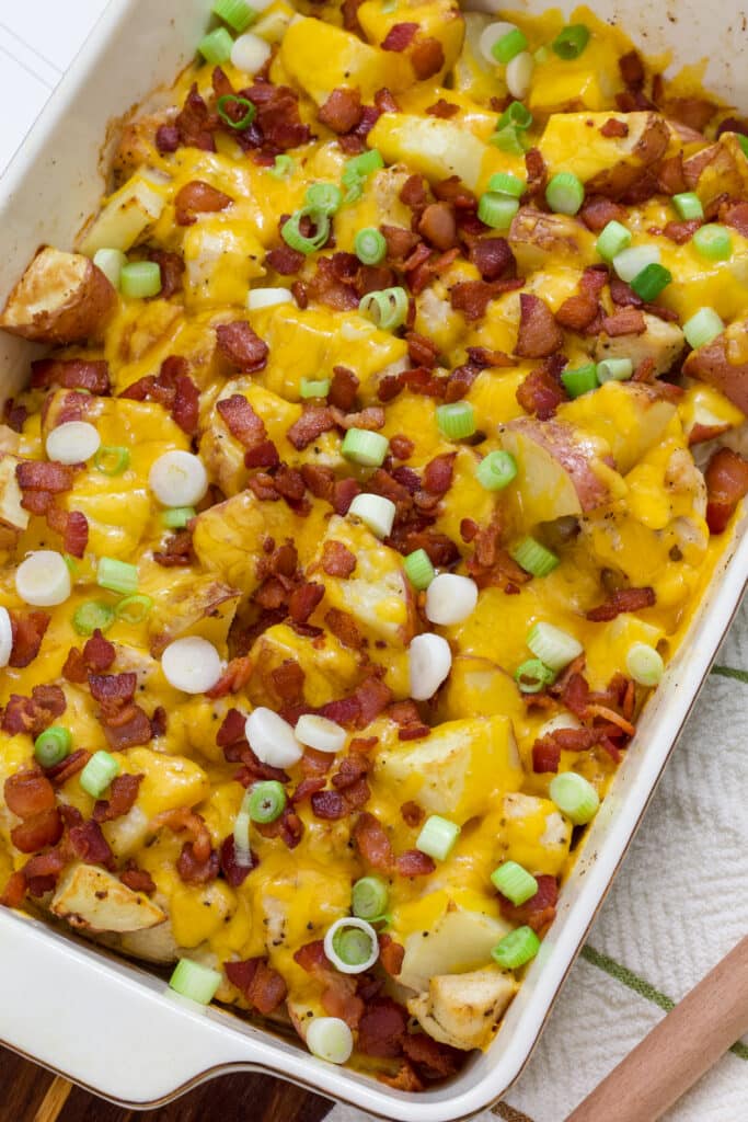 A rectangle casserole dish full of Easy Loaded Baked Potato and Chicken Casserole.