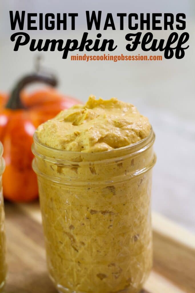 Close up of a small mason jar filled with Low Calorie Weight Watchers Pumpkin Fluff. The recipe title is in text above it.