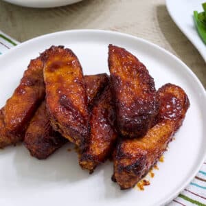 Overhead view of a plate of ribs.