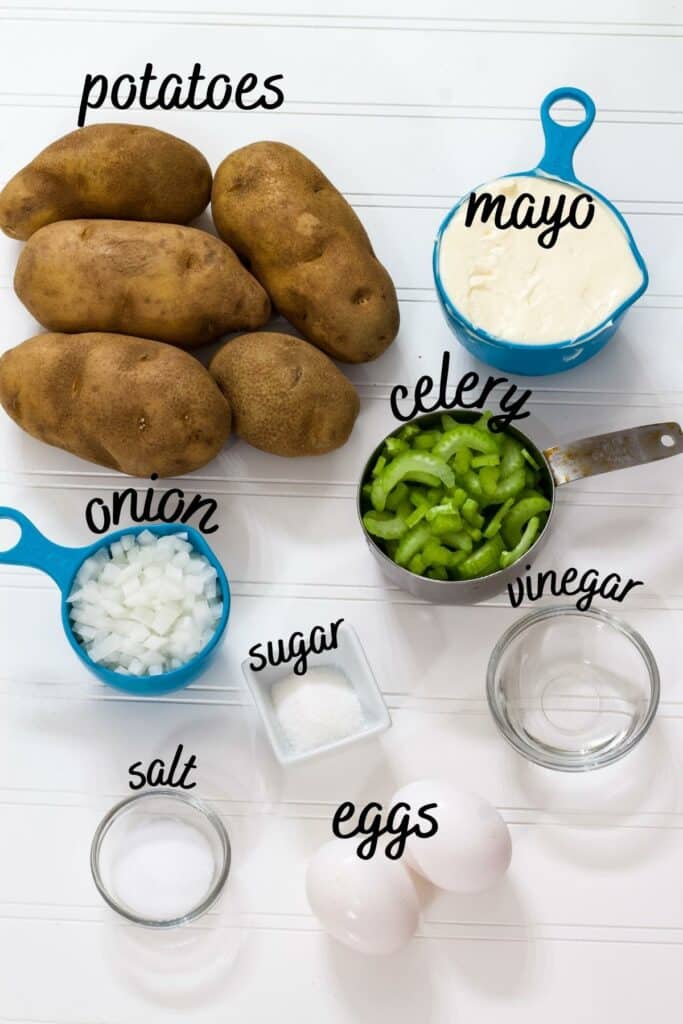 All of the ingredients needed to make Hellmann's Mayonnaise Original Potato Salad Recipe measured out and sitting on a table.