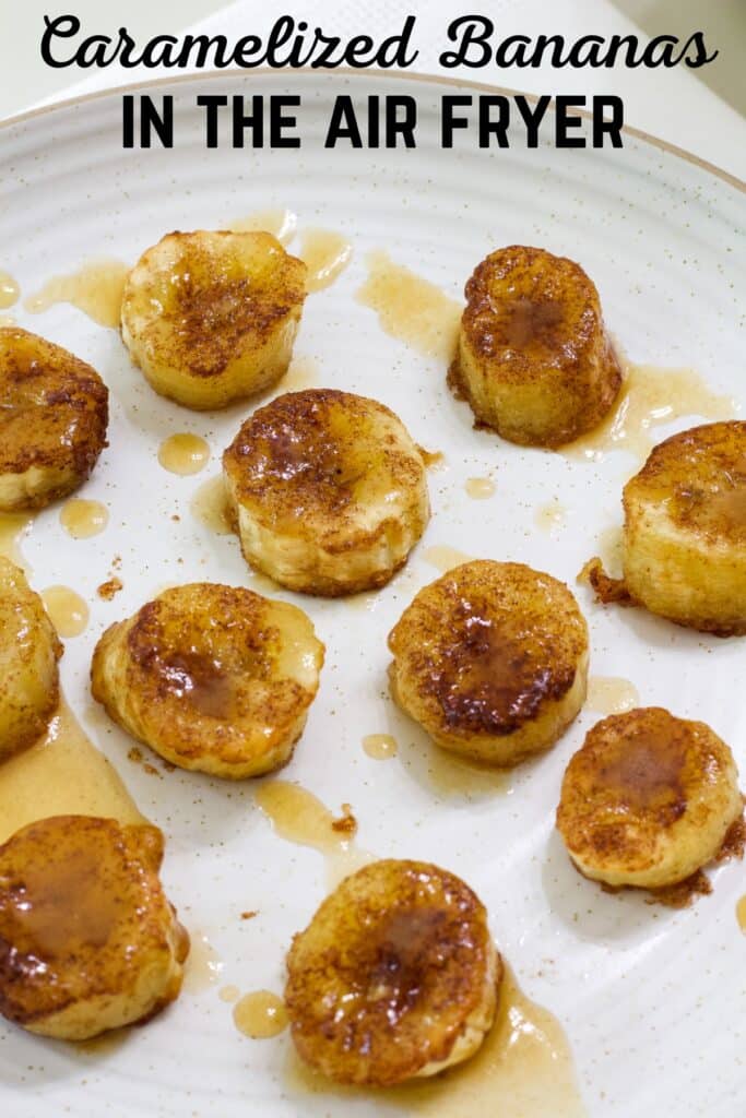 Several air fried banana slices on a plate and drizzled with caramel sauce. The recipe title is in text at the top.