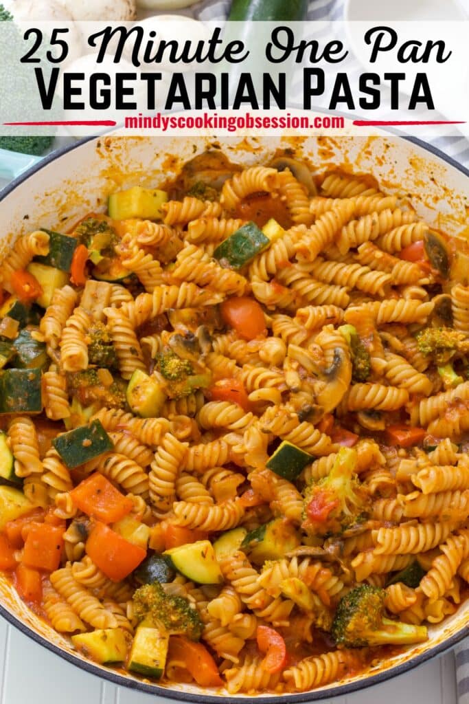 A large skillet filled with One Pot Vegetarian Pasta and the recipe title is in text at the top.