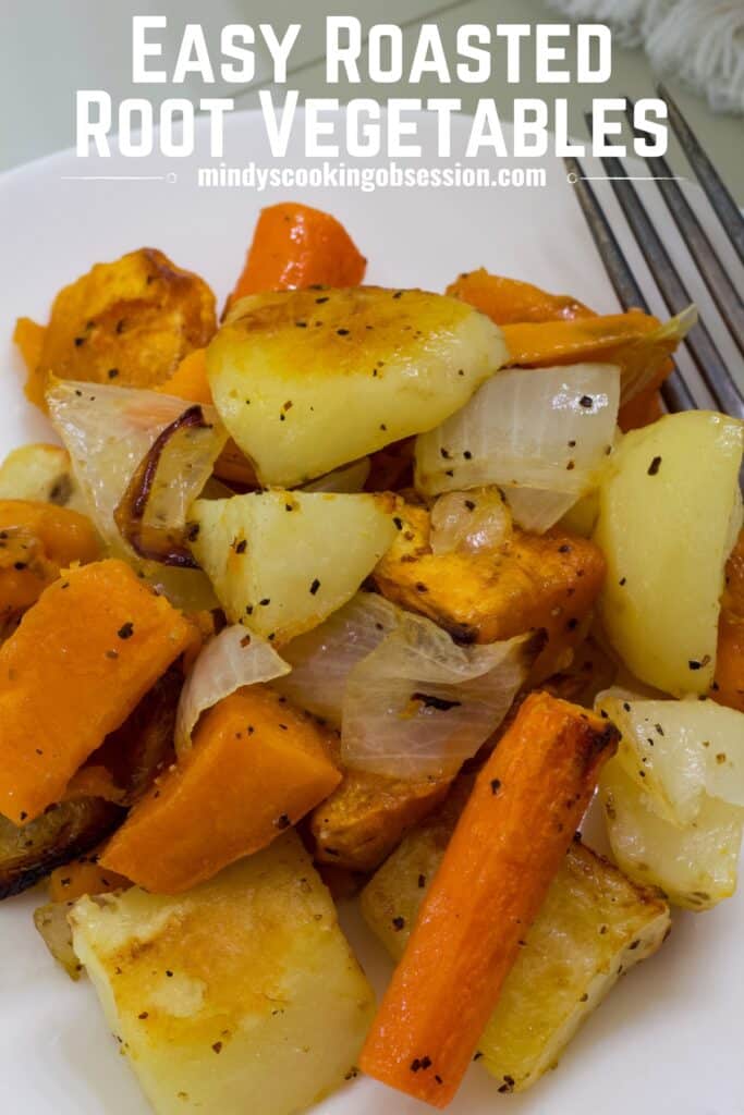 A close up of one serving of Easy Oven Roasted Root Vegetables with the recipe title in text at the top of the image.