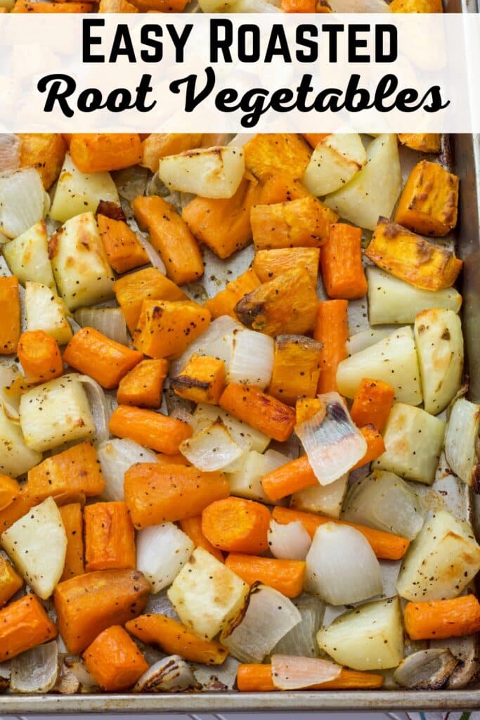 Close up of the corner of the sheet pan with roasted root vegetables on it after it came out of the oven.