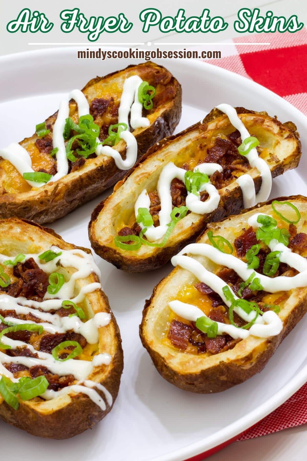 Homemade Loaded Potato Skins in the Air Fryer Recipe requires only 5 ingredients to make a this classic quick, easy and delicious appetizer. via @mindyscookingobsession