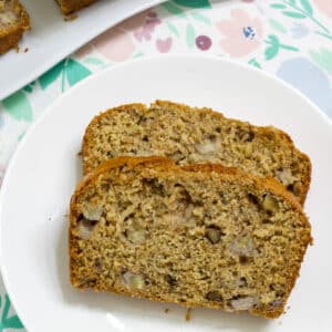 Two slices of The Best WW (Weight Watchers) Banana Bread on a white plate.