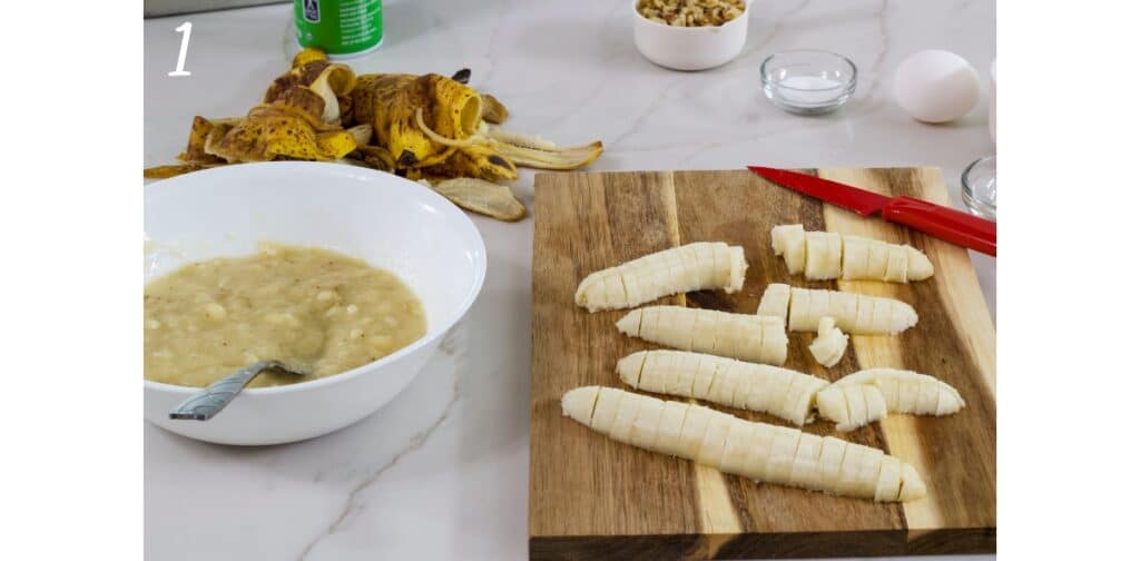 A bowl of mashed banana on the left and some cut up bananas on a cutting board on the right.