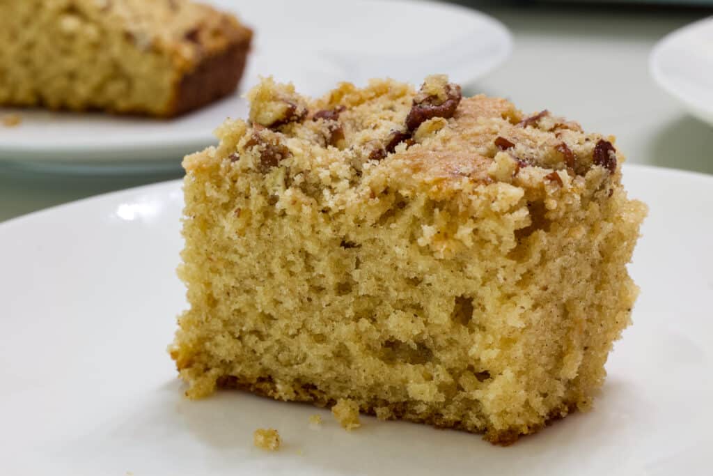 Side close up view of one piece of cowboy coffee cake.