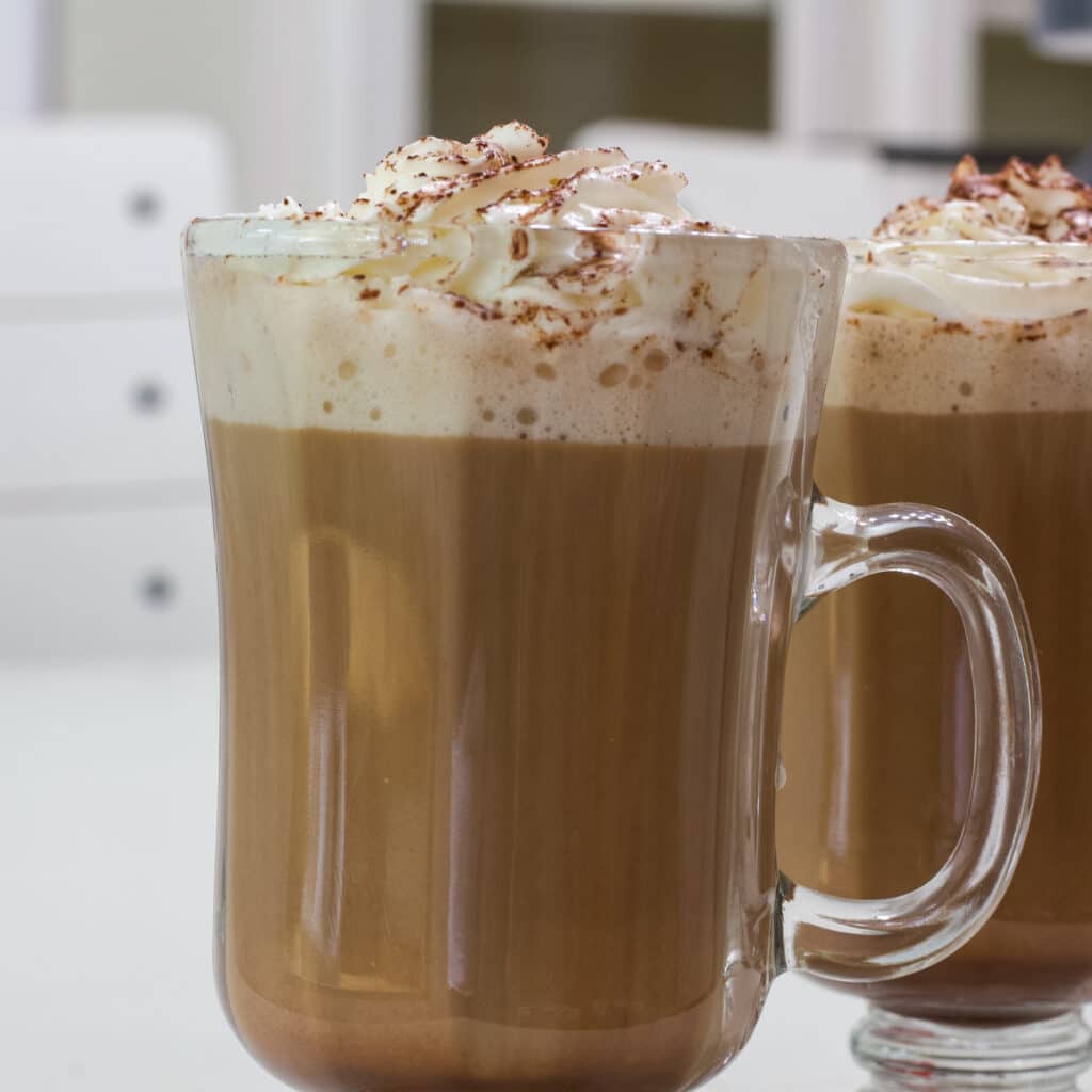 A glass coffee mug full of Easy Chocolate Coffee (Hot Cafe Mocha).