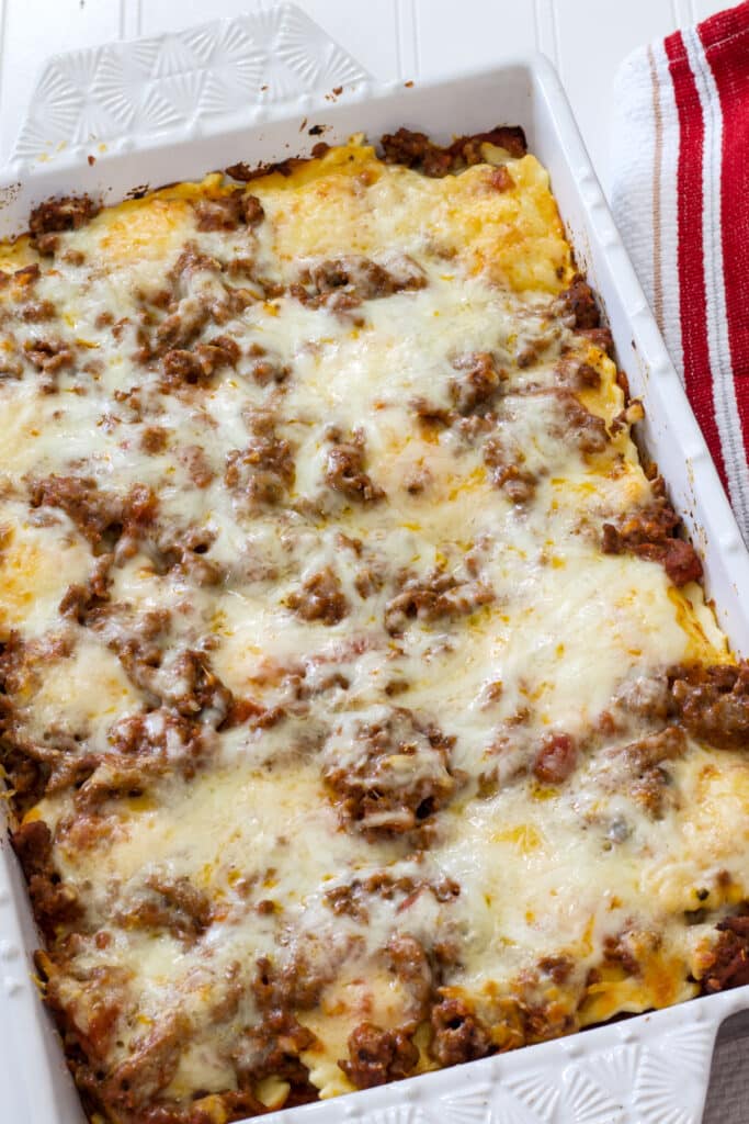 The entire casserole dish full of Easy Lazy Baked Ravioli Lasagna Casserole after it came out of the oven.