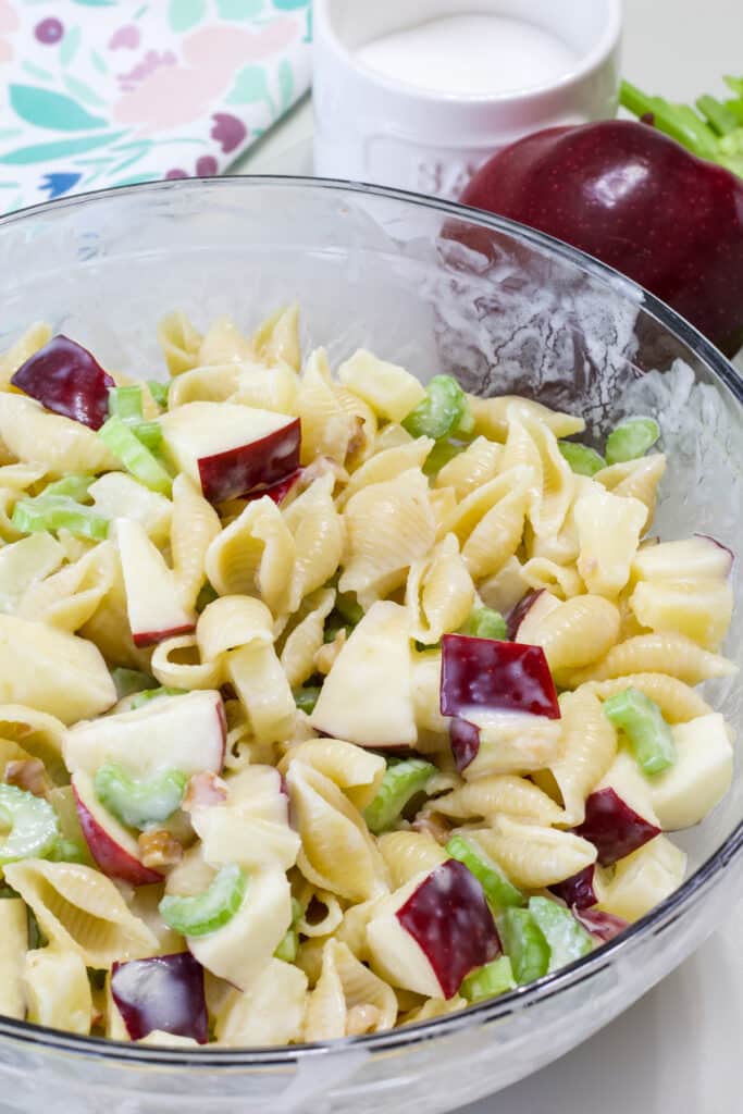The finished Waldorf Pasta Salad with Pineapple in a large glass bowl.