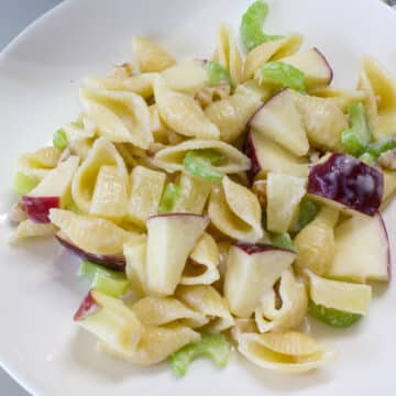 Overhead view of one serving of Waldorf Pasta Salad with Pineapple.