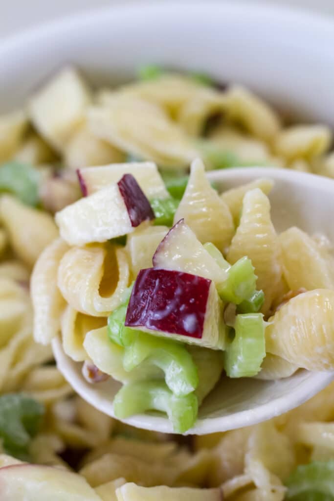A spoonful of Waldorf Pasta Salad with Pineapple.