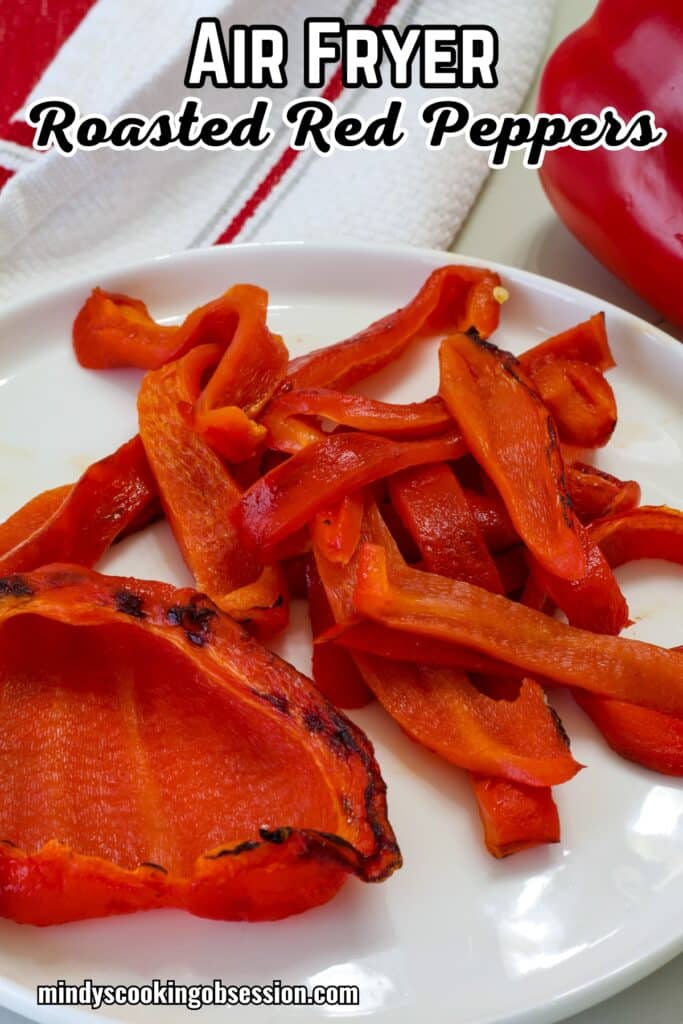Roasted red peppers on a white plate, the recipe title is in text at the top.