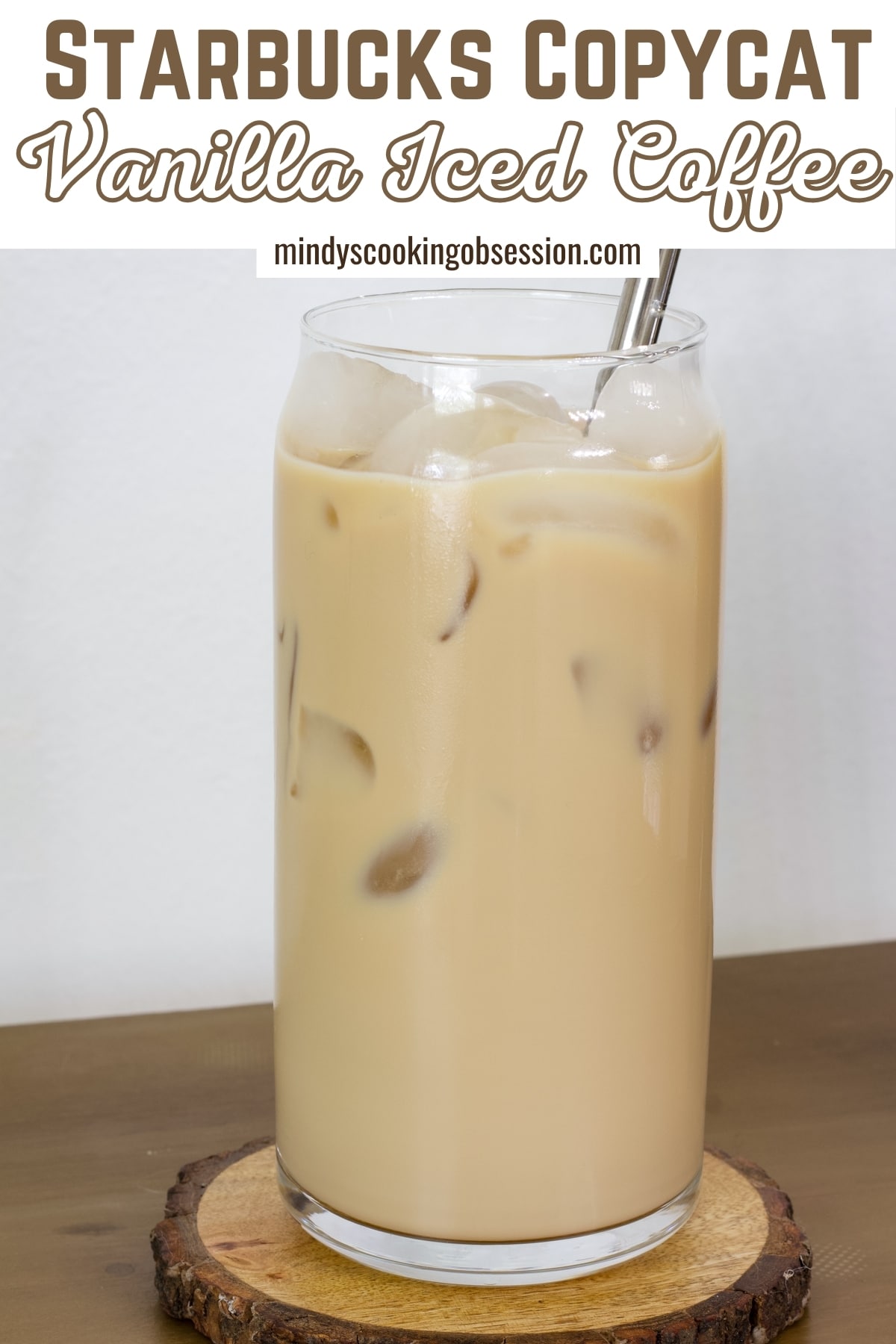 Craving a Starbucks iced vanilla coffee? Save money and make it yourself! Try this easy homemade recipe using strong coffee, vanilla syrup, and cold milk. via @mindyscookingobsession