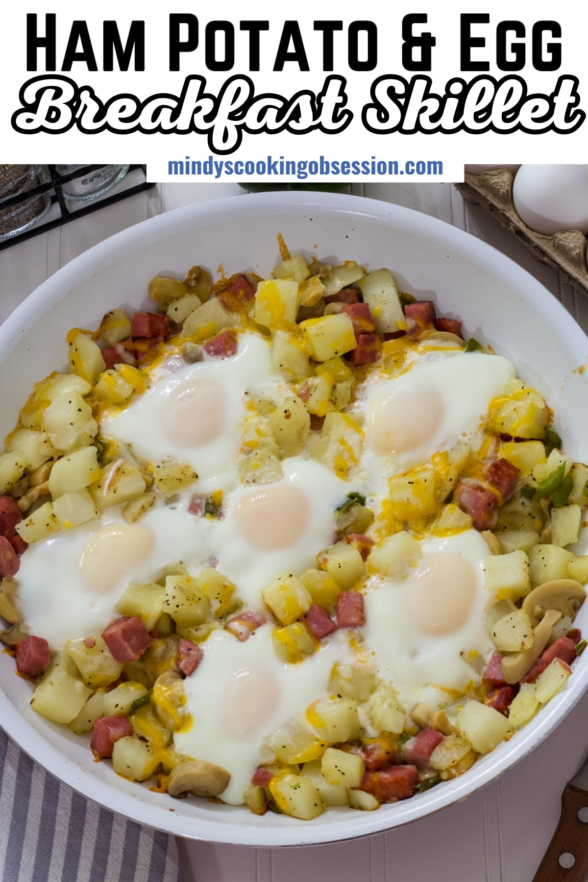 Craving a hearty breakfast? Try this easy one-pan recipe for a delicious skillet with eggs, ham, and potatoes. Perfect for a satisfying start to the day. via @mindyscookingobsession
