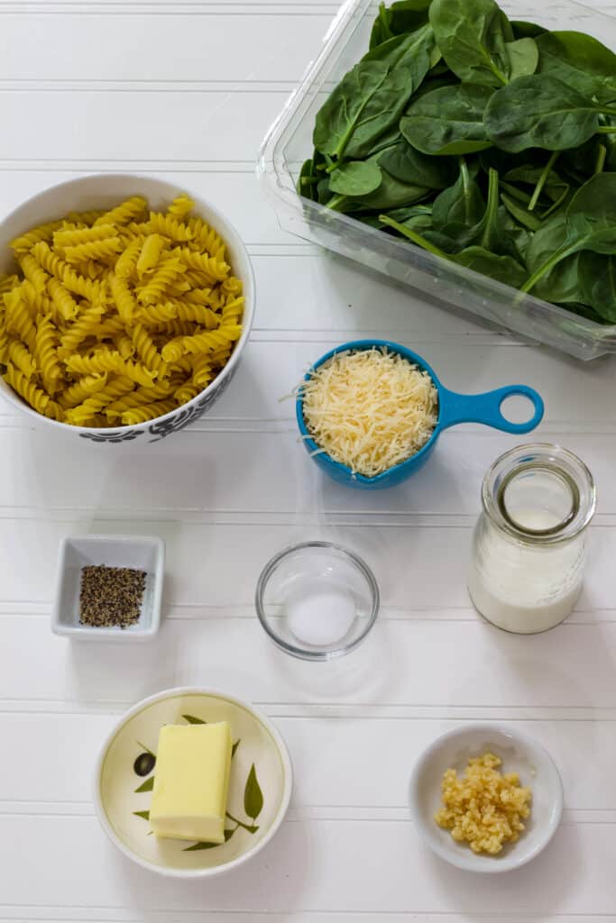All of the ingredients measure out to make the Easy Garlic Butter Pasta and Sautéed Spinach Recipe.