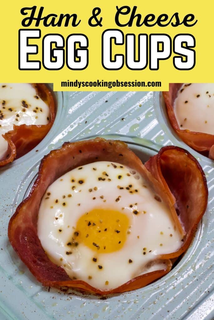Close up of one egg cup in the muffin tin, the recipe title is a the top in text so the image can be saved on Pinterest.