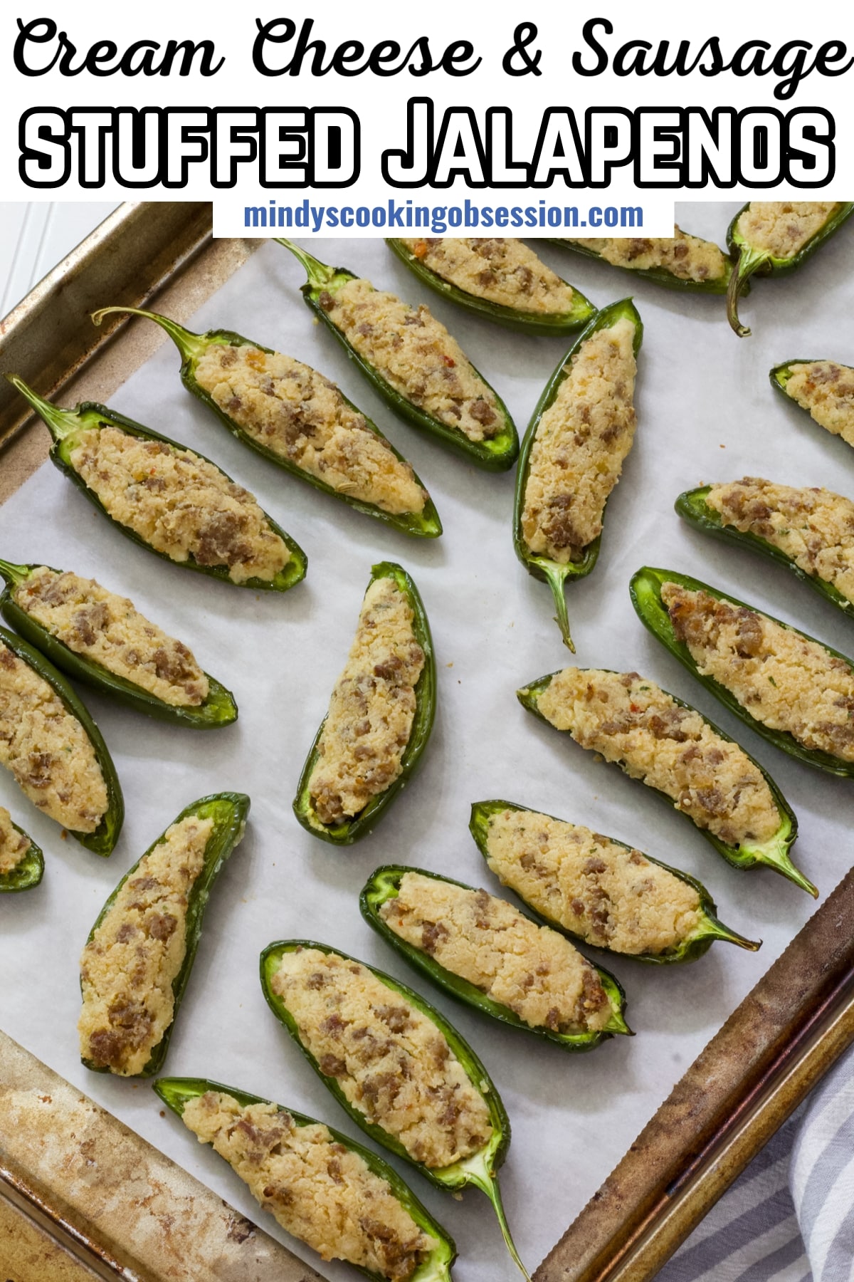 Spice up your game day spread with these irresistible stuffed jalapeno peppers! Filled with cream cheese, savory sausage, and a hint of garlic, these peppers are bursting with flavor. With only 6 ingredients, they're a breeze to whip up, leaving you more time to enjoy the festivities. via @mindyscookingobsession