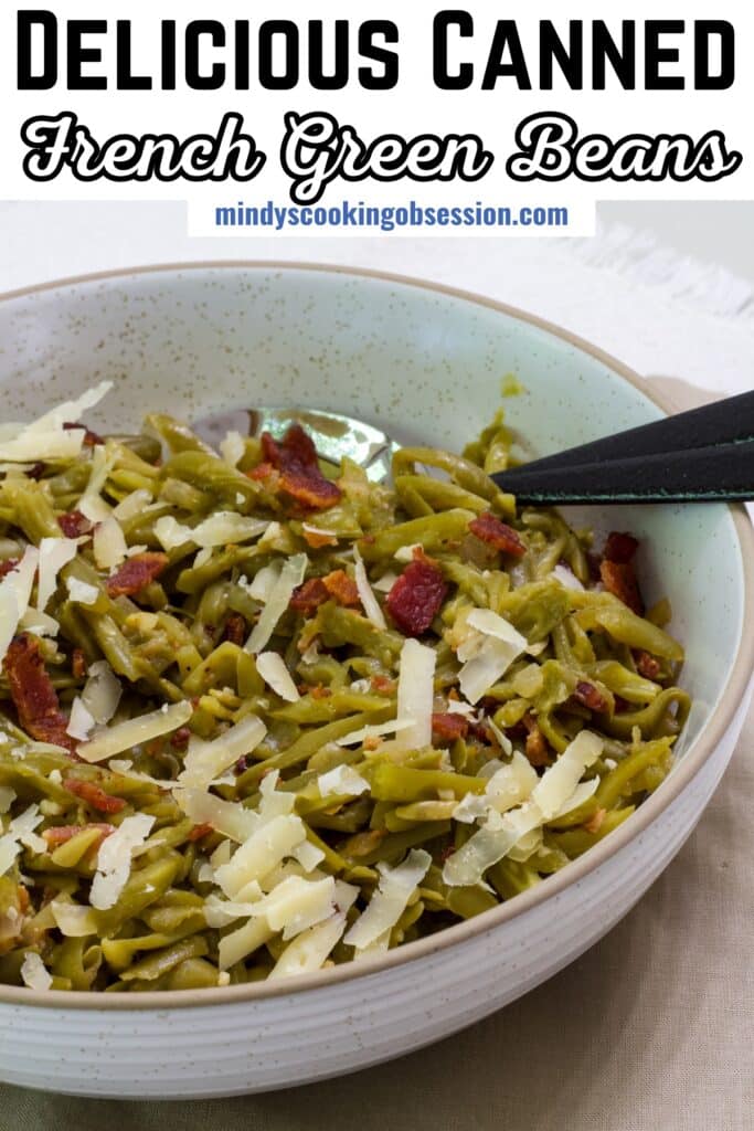 A bowl of Parmesan topped french green beans, the recipe title is a the top in text so the image can be pinned on Pinterest.