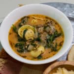 The feature image of one serving of soup in a white bowl.